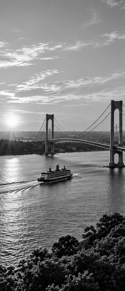 The Verrazzano-Narrows Bridge at dusk, a ferry crossing beneath it